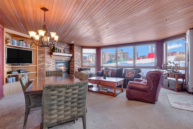 living room featuring a view of city, built in features, carpet, an inviting chandelier, and wooden ceiling