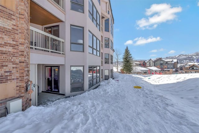 view of snow covered building