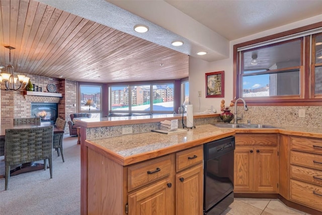 kitchen with tile countertops, a sink, black dishwasher, wood ceiling, and open floor plan