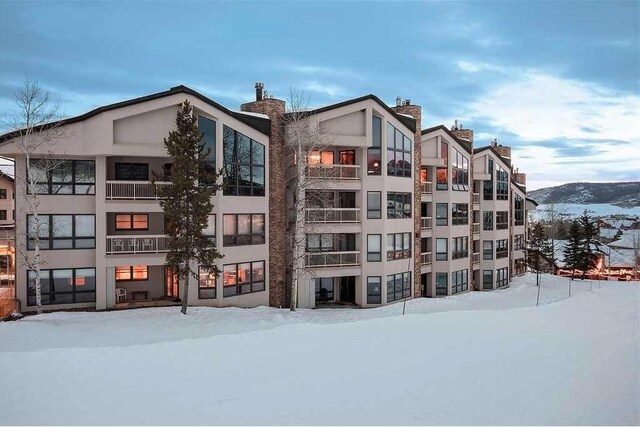 view of snow covered property