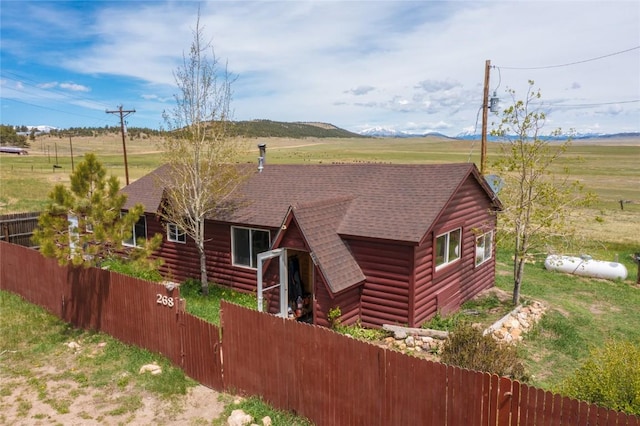 view of front of home with a mountain view