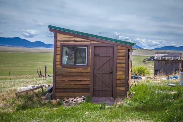 view of outdoor structure with a mountain view