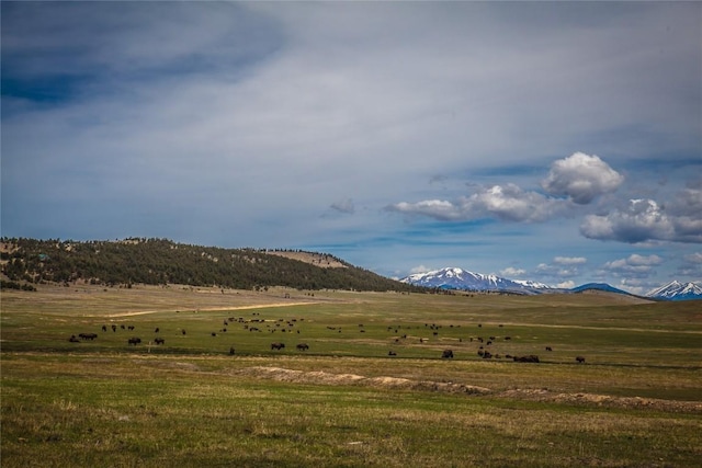 property view of mountains featuring a rural view