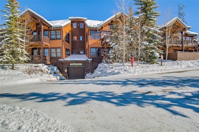 view of snow covered property