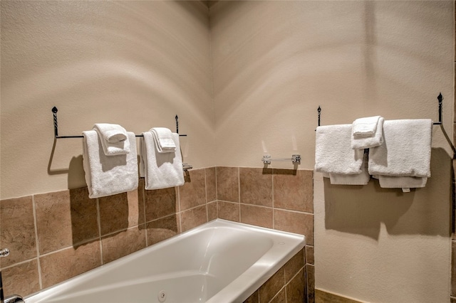 bathroom with a jetted tub