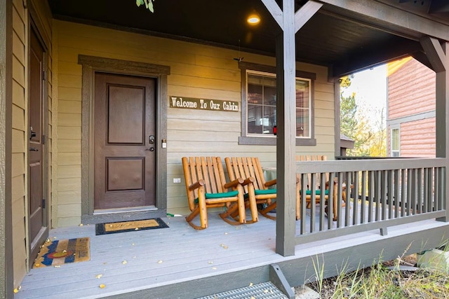 entrance to property with a porch