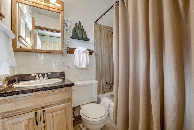 full bathroom featuring vanity, toilet, shower / bath combo with shower curtain, and backsplash