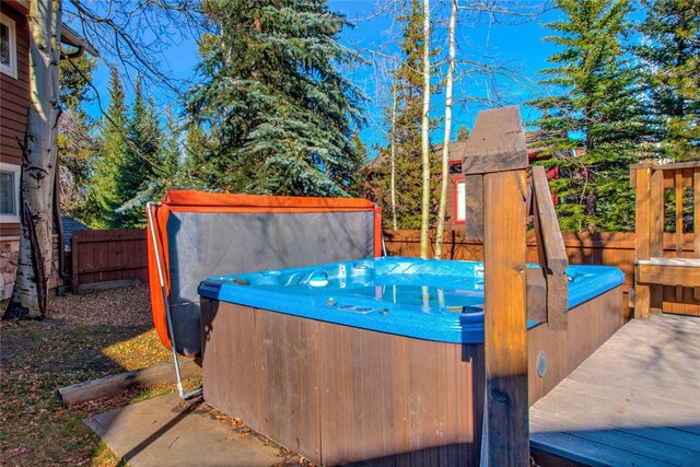 exterior space featuring a hot tub