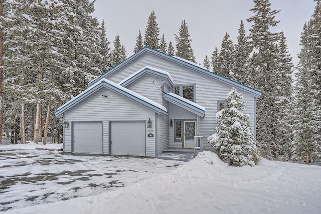 view of front of property with a garage