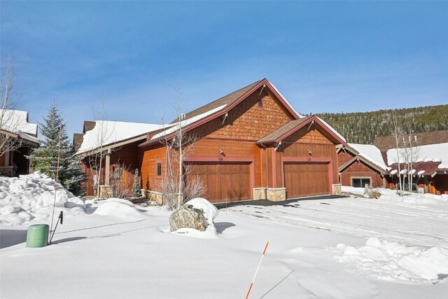 rustic home with a garage