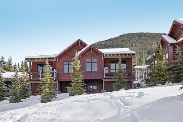 view of front of property with a mountain view