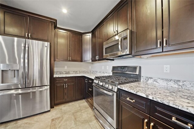 dining area featuring hardwood / wood-style floors, ceiling fan, and sink