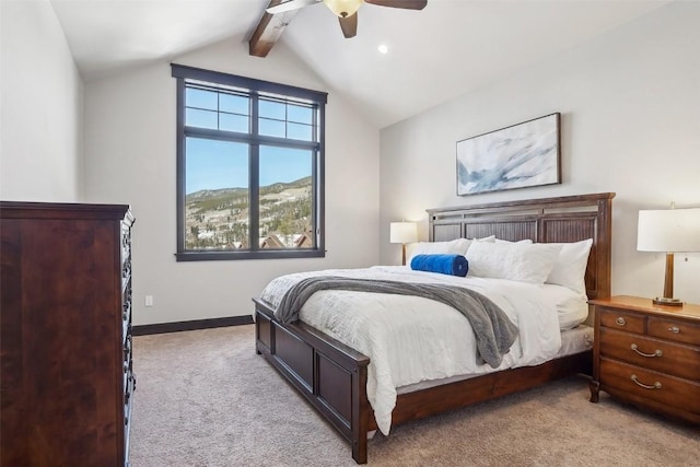 bedroom with baseboards, light colored carpet, ceiling fan, and vaulted ceiling with beams