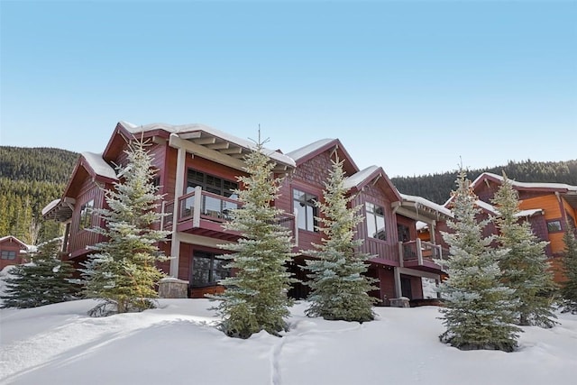 view of snow covered property