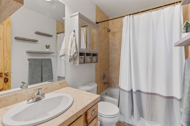 full bathroom featuring vanity, toilet, and shower / tub combo with curtain