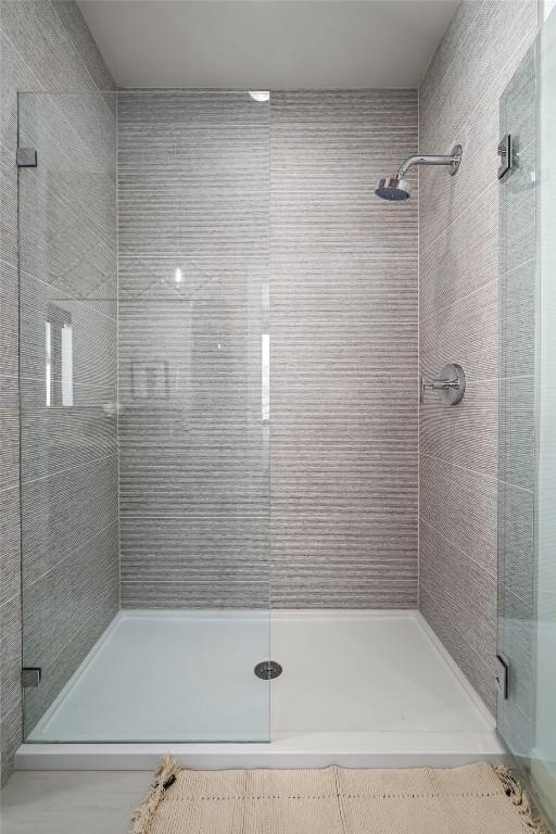 bathroom with an enclosed shower