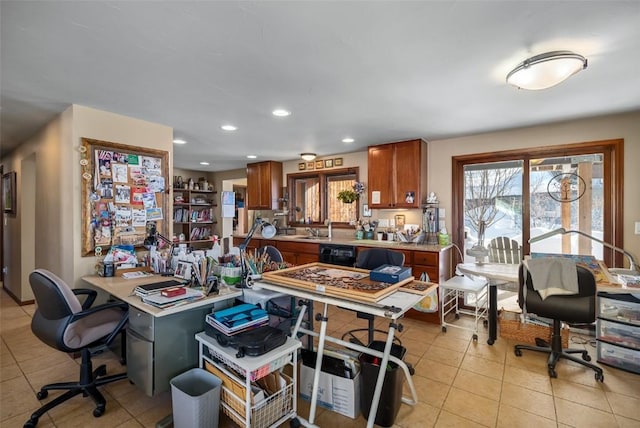 office with sink and light tile patterned floors