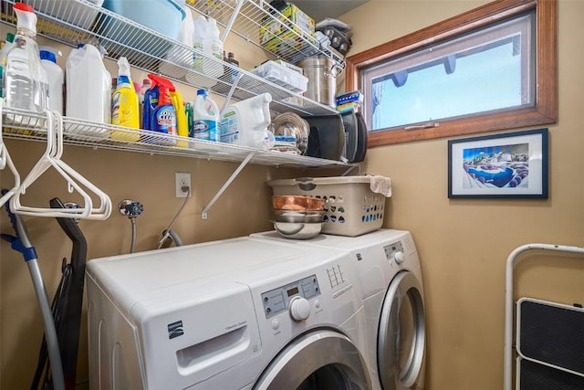 clothes washing area featuring washing machine and dryer