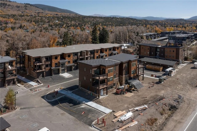 drone / aerial view featuring a mountain view