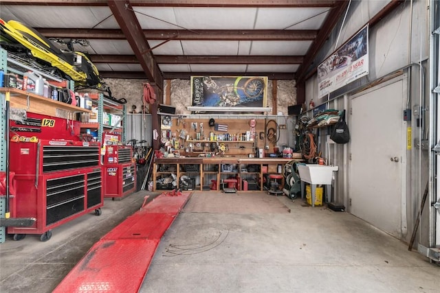 garage with a workshop area