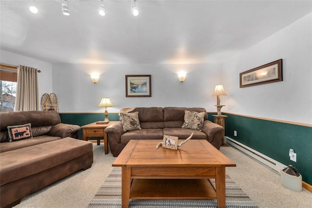 living room with a baseboard heating unit