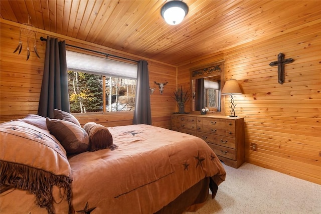 bedroom featuring wood walls, carpet floors, and wood ceiling