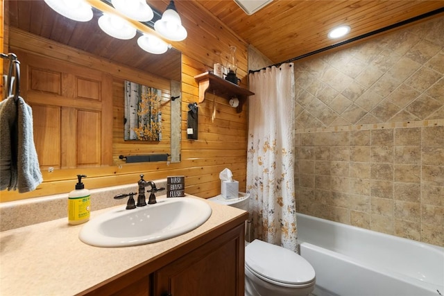 full bathroom with wood walls, vanity, shower / bath combo, and toilet