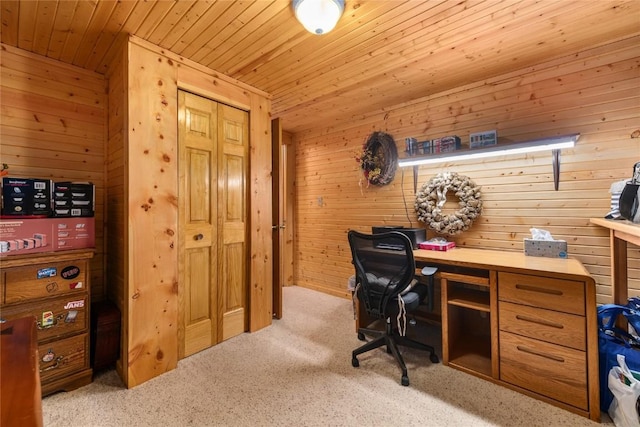 office space featuring wood walls, wood ceiling, and light carpet