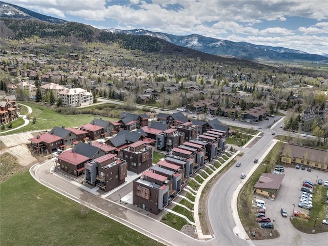 drone / aerial view featuring a mountain view