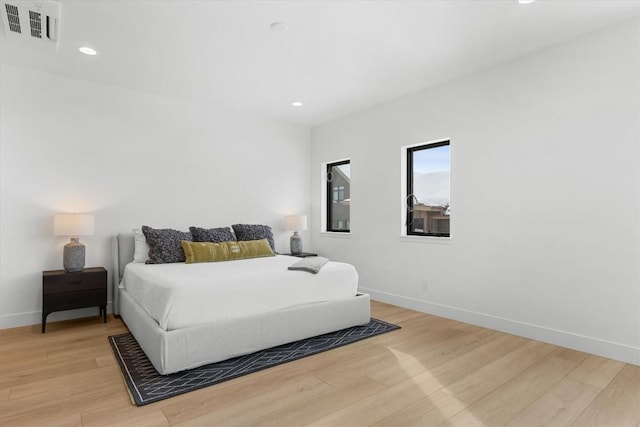 bedroom featuring light wood-type flooring