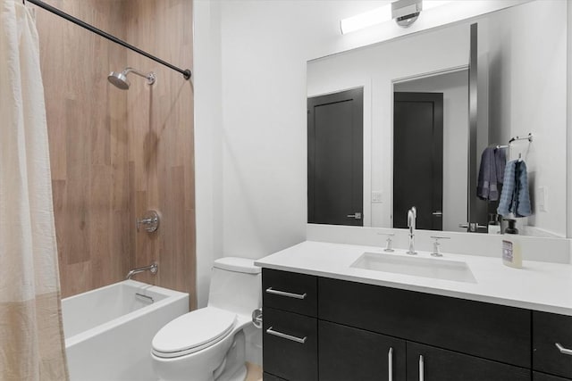 full bathroom featuring vanity, toilet, and shower / bath combo with shower curtain