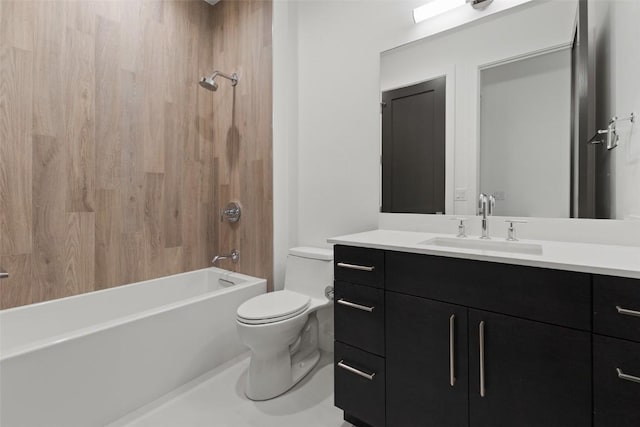 full bathroom with toilet, vanity, and washtub / shower combination