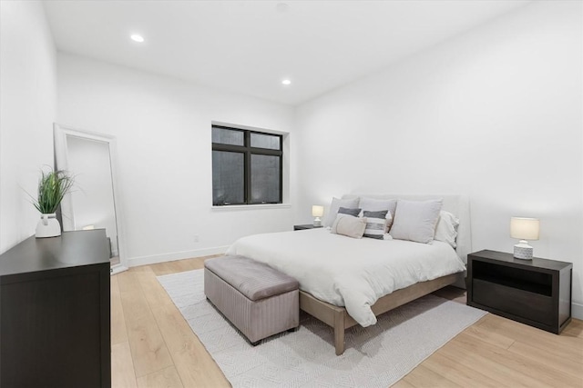 bedroom featuring light hardwood / wood-style floors