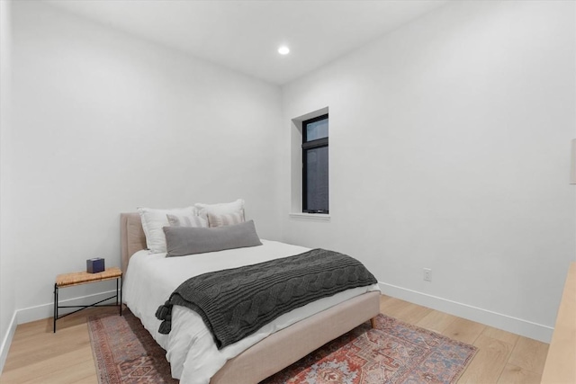 bedroom featuring light wood-type flooring