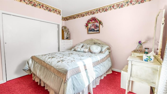 carpeted bedroom with a closet