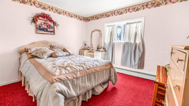 carpeted bedroom featuring a baseboard heating unit