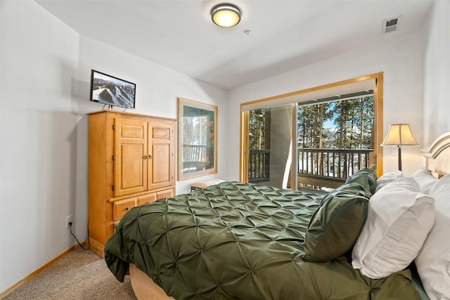 bedroom featuring light carpet, visible vents, baseboards, lofted ceiling, and access to outside