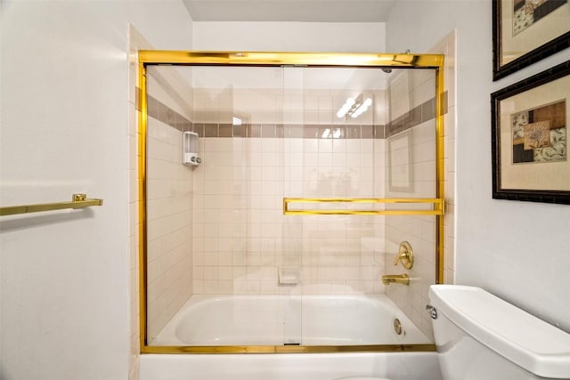 full bath with toilet and combined bath / shower with glass door