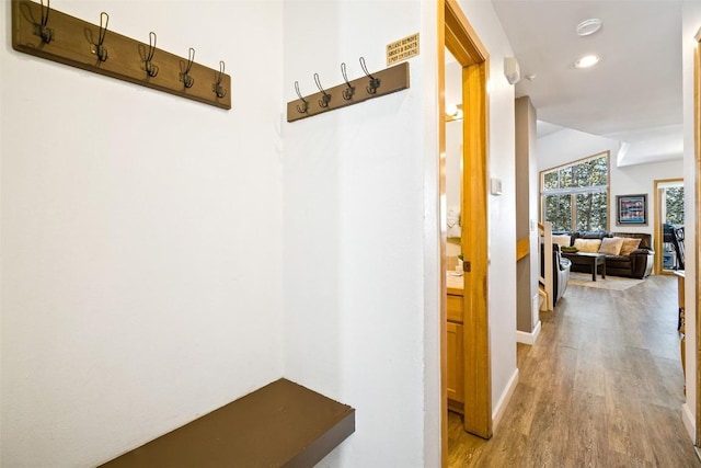 hallway featuring recessed lighting and light wood finished floors