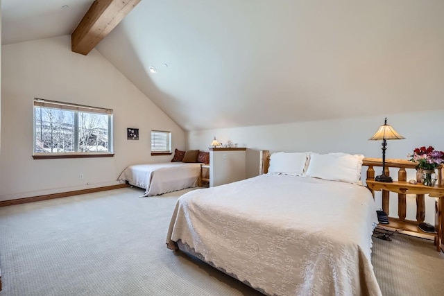 bedroom featuring carpet flooring, lofted ceiling with beams, and baseboards