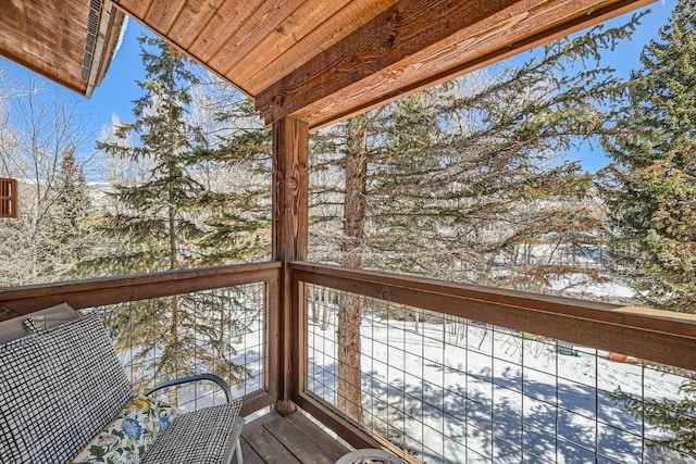 view of snow covered deck