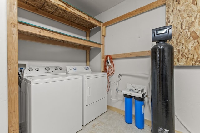 laundry room with washing machine and dryer