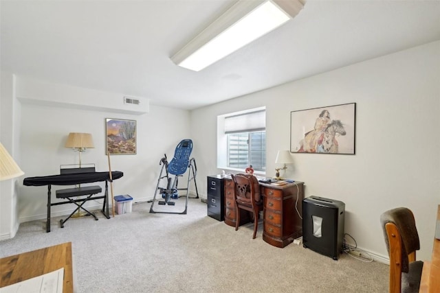 office with visible vents, baseboards, and carpet floors