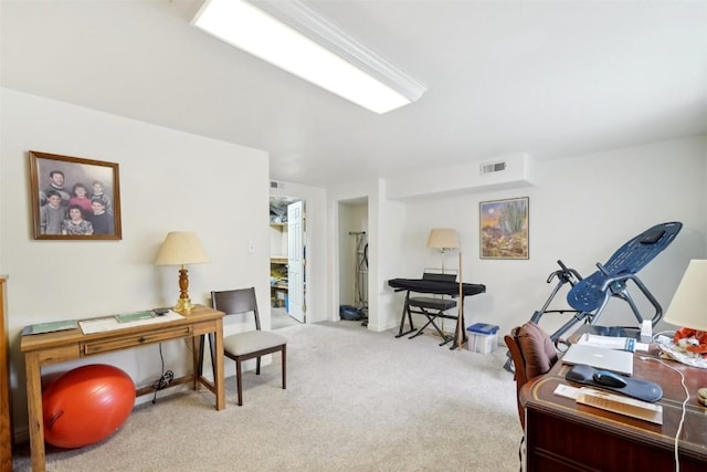 office space with visible vents and carpet flooring