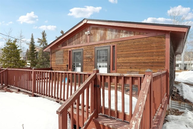 view of snow covered deck