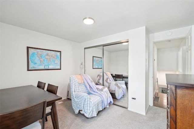 carpeted bedroom featuring a closet