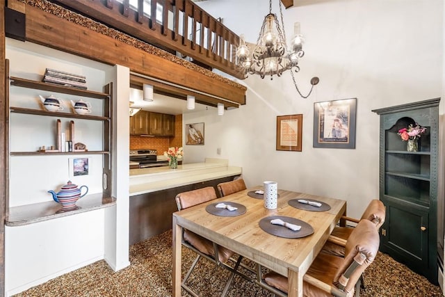 dining area featuring a notable chandelier