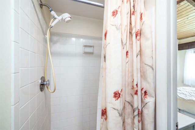 bathroom featuring walk in shower