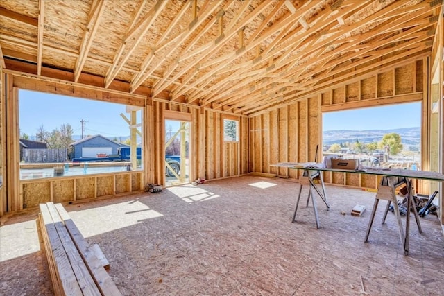 miscellaneous room with a mountain view