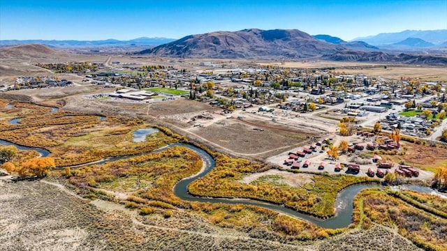 drone / aerial view featuring a mountain view